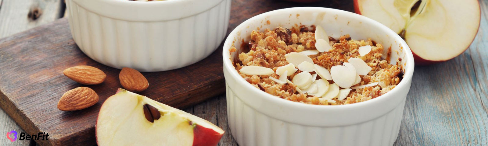 Healthy apple crumble in a small baking dish with oats and cinnamon topping