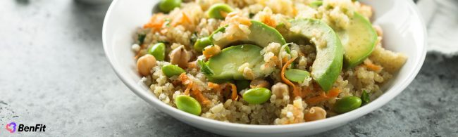 Spring power bowl with quinoa, avocado, edamame, cucumber and radishes for healthy energy